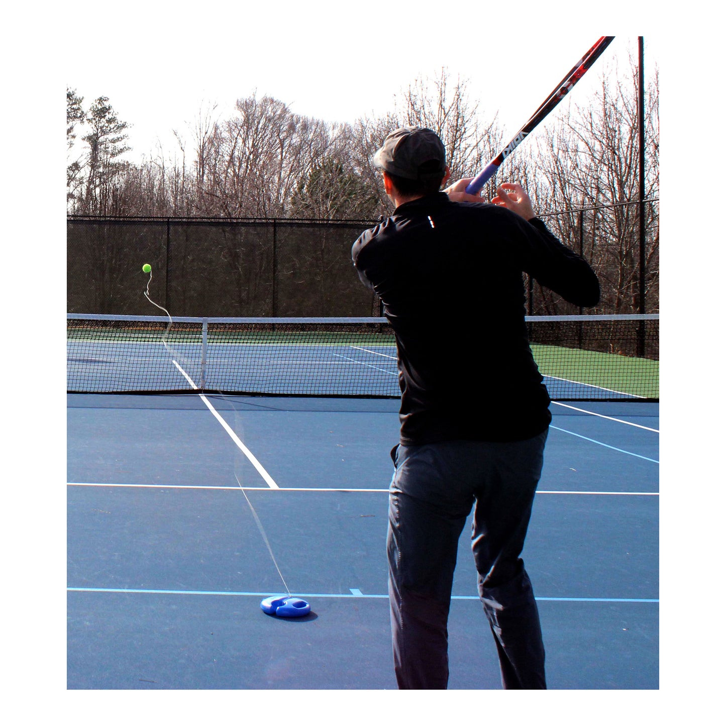 FILL-n-DRILL Tennis Trainer with extra ball and string